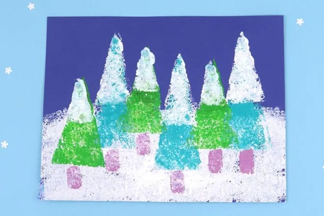 幼儿手工制作：海绵印画积雪下的冬季大树